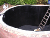 Kidney shaped pond fibreglassed by GRP photo 7