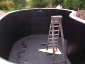 Kidney shaped pond fibreglassed by GRP photo 8