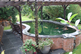 Kidney shaped pond fibreglassed by GRP photo 12