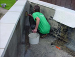 A Koi pond being fibreglassed by GRP